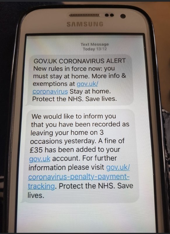 scam text message fining the recipient for leaving home during the covid-19 outbreak fine