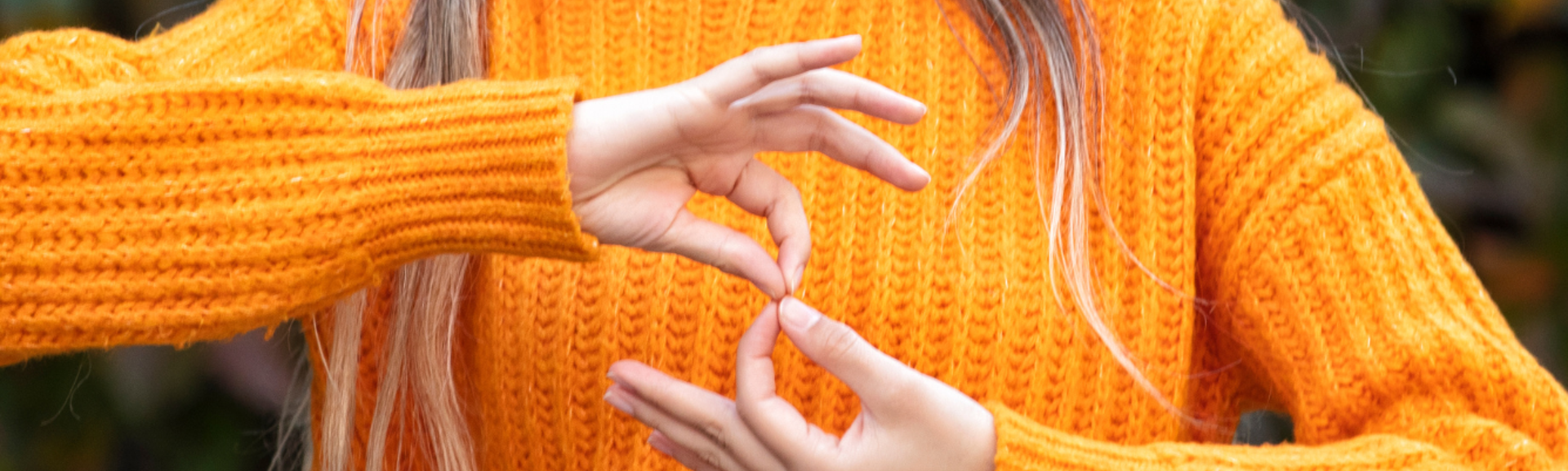 A woman using sign language