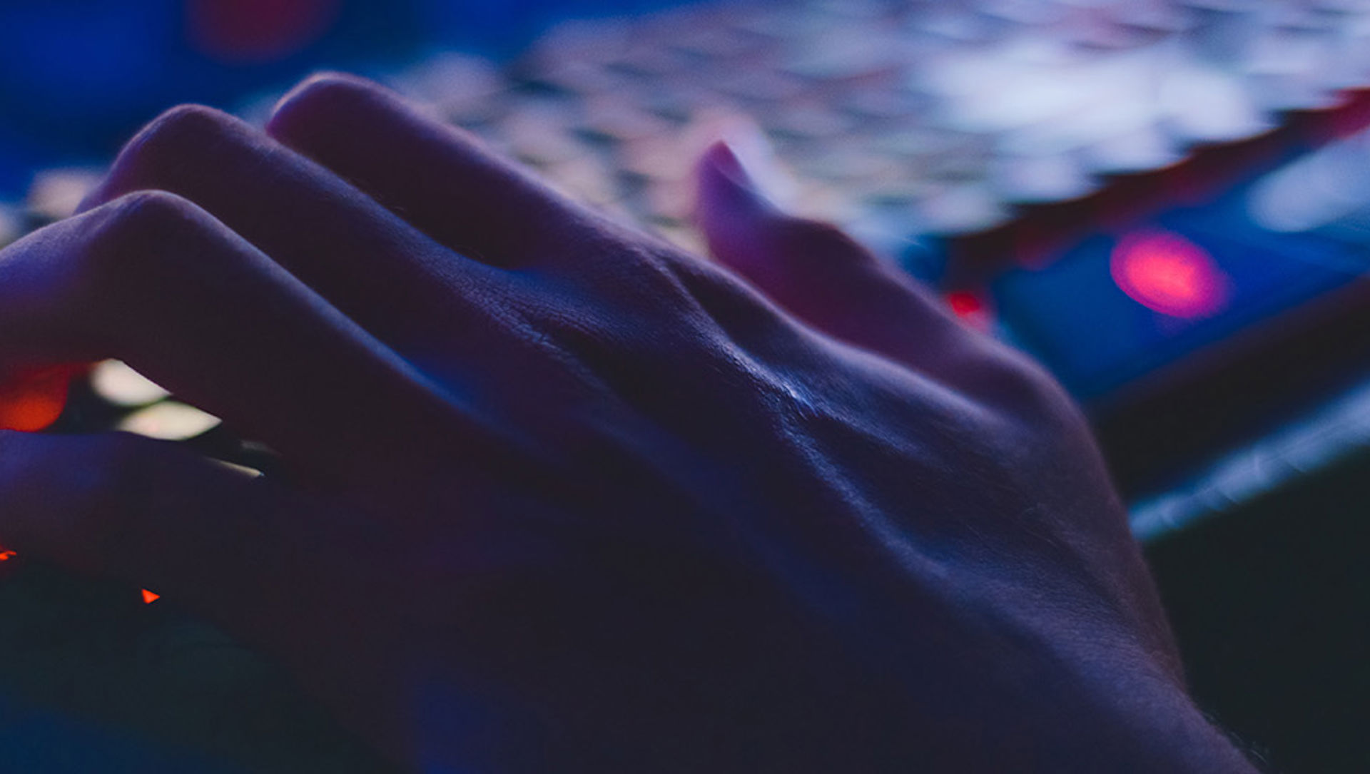 Person typing on keyboard