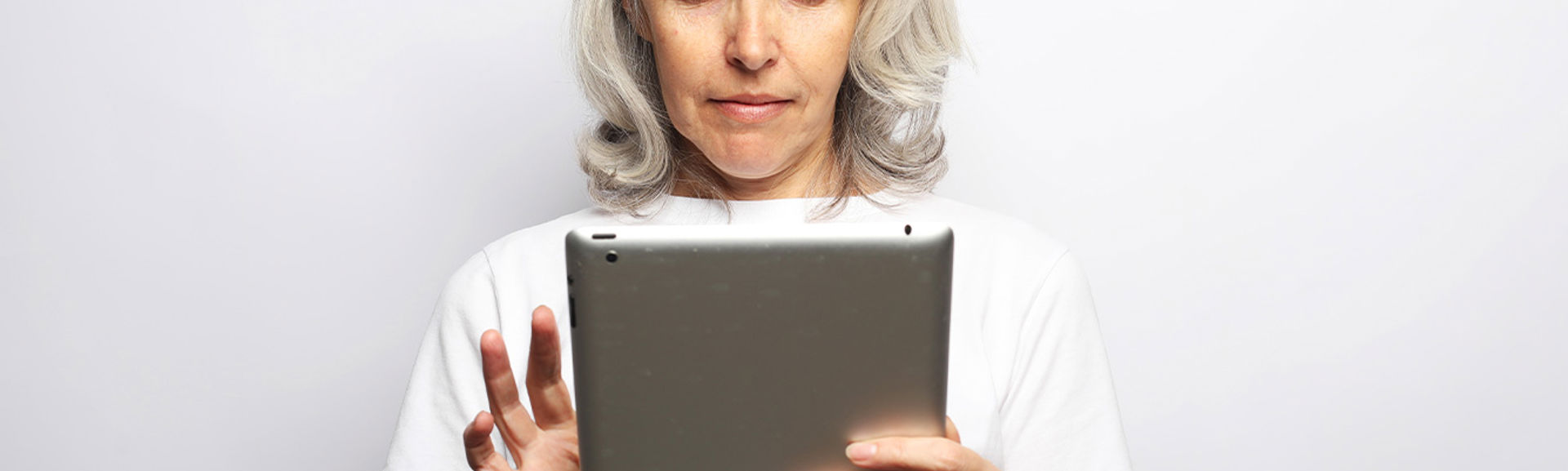 Woman looking at tablet