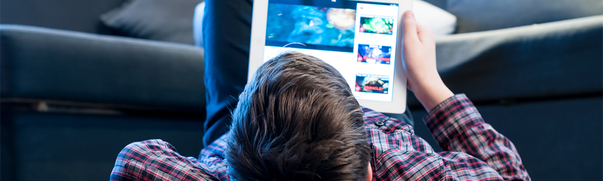 Young boy using a tablet device