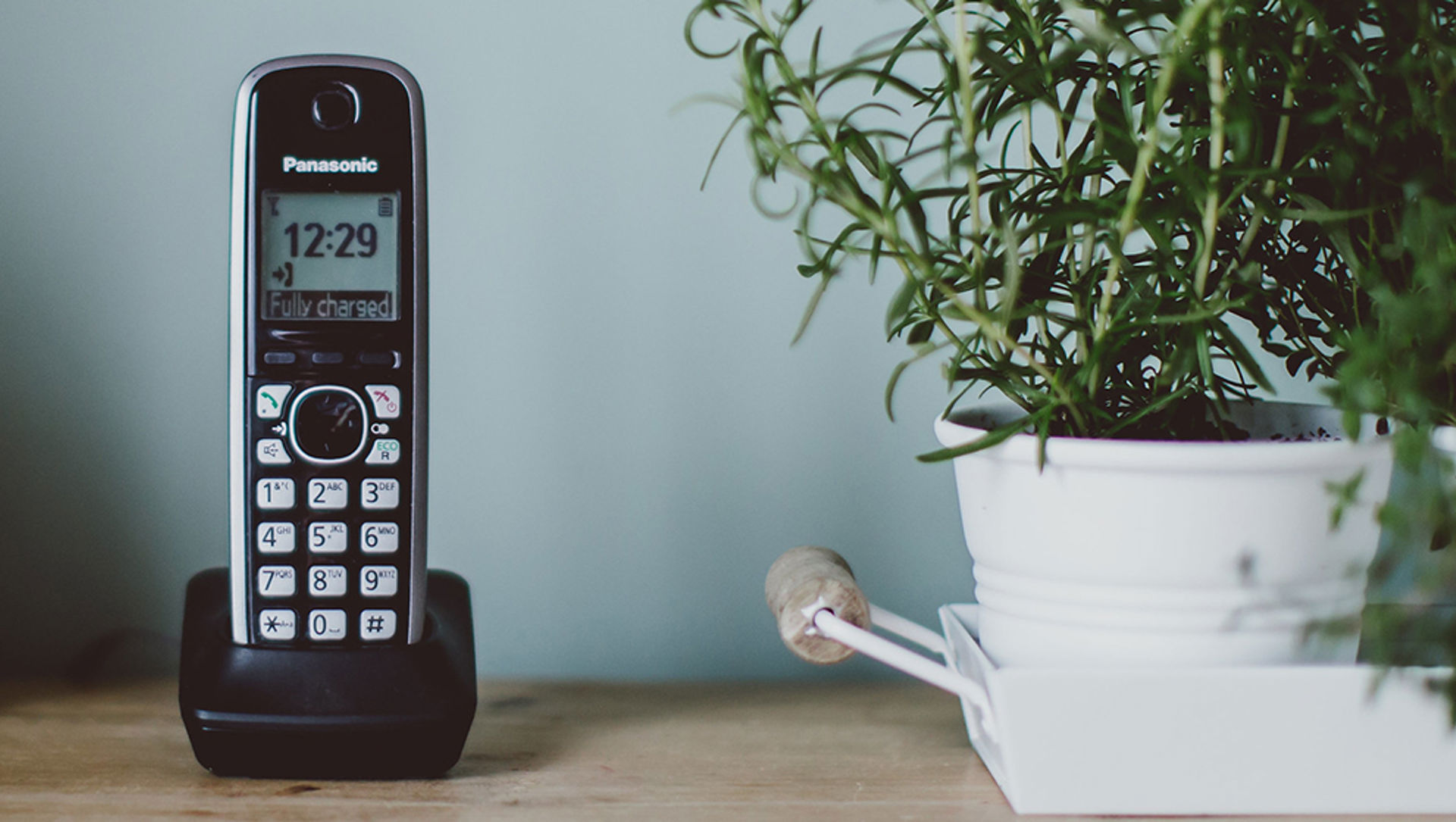 Cordless landline phone on a desk