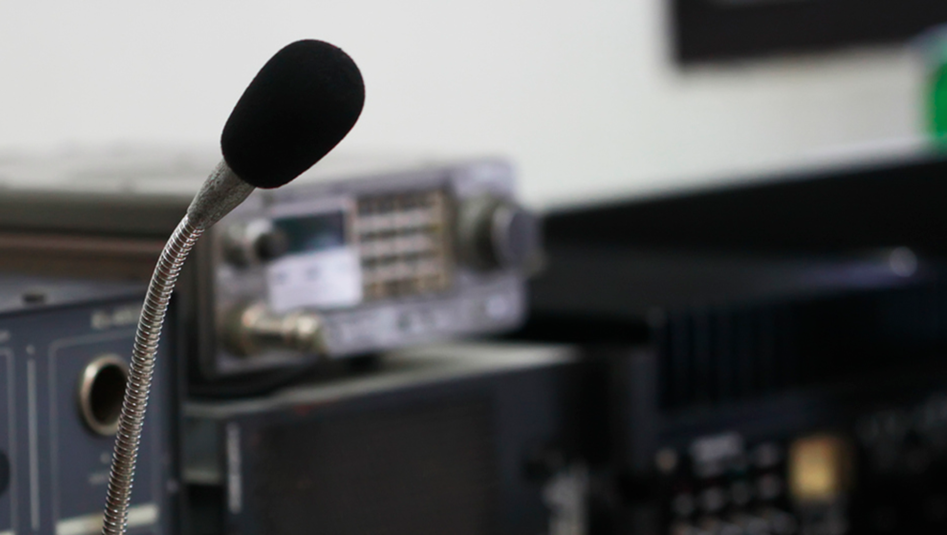Amateur radio microphone on a studio desk.