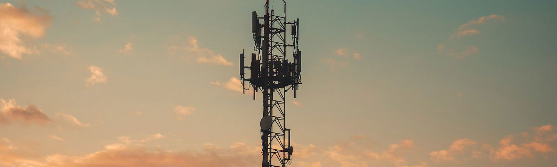 A mobile mast with sunrise in background