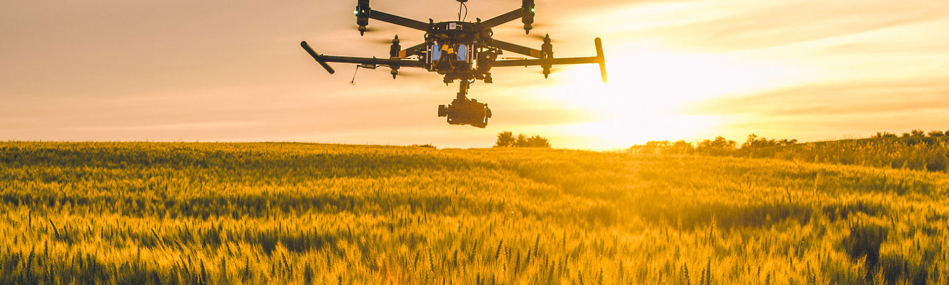 A drone flying across a field