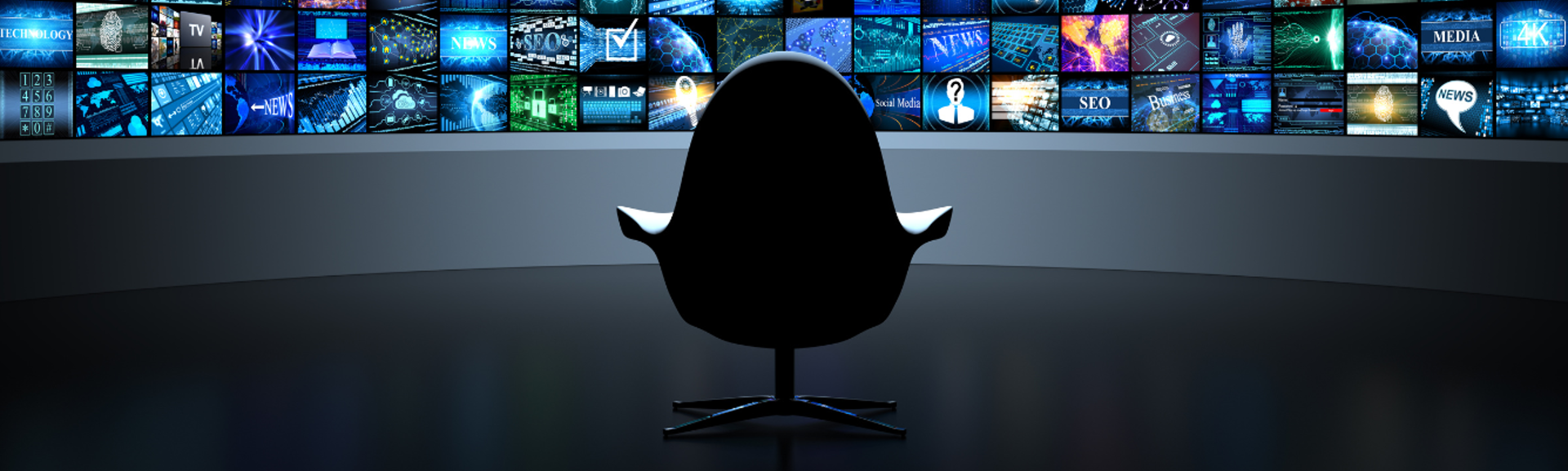 An empty swivel chair sitting in front of dozens of tv screens, each showing a different programme