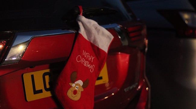 Christmas stocking on a car