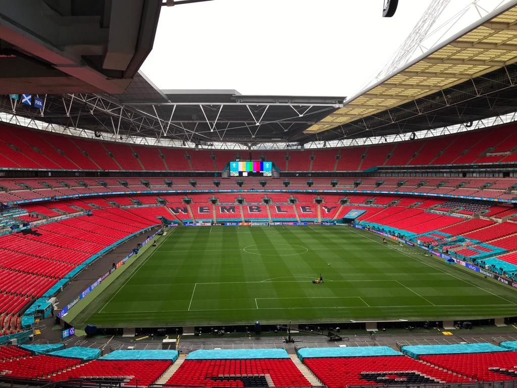 View of Wembley stadium pitch from the rafters.