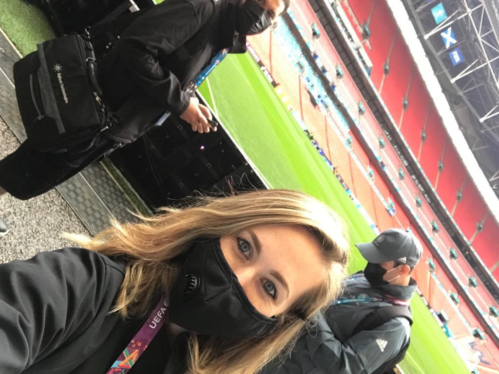 Photo of Janelle at pitchside.