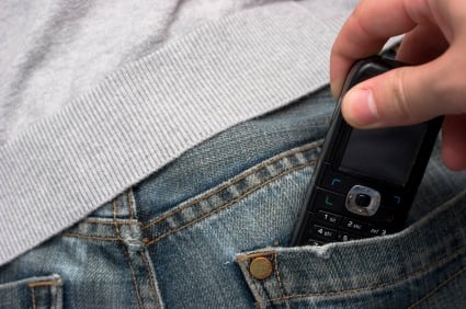Pickpocket stealing phone